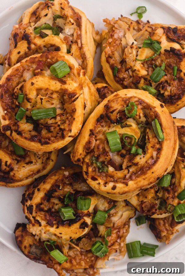 Golden bbq bites with chicken, mozzarella cheese, and topped with green onions.
