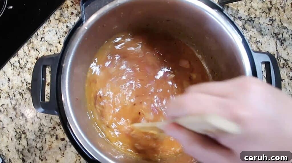 Instant Pot Linguine alla Parma: Creamy Prosciutto & Parmesan 16 Stirring pot