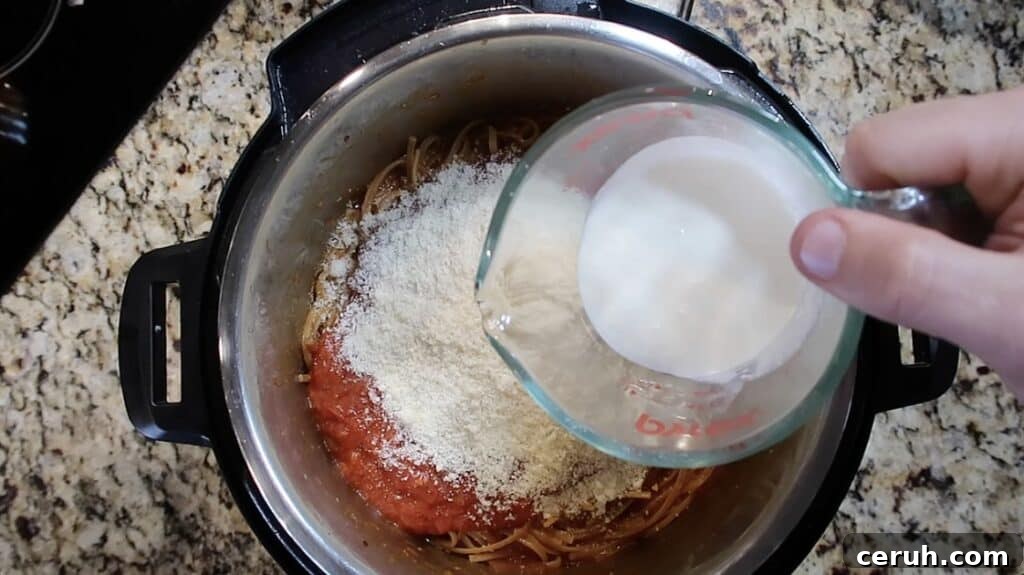 Instant Pot Linguine alla Parma: Creamy Prosciutto & Parmesan 26 Adding cream to pot