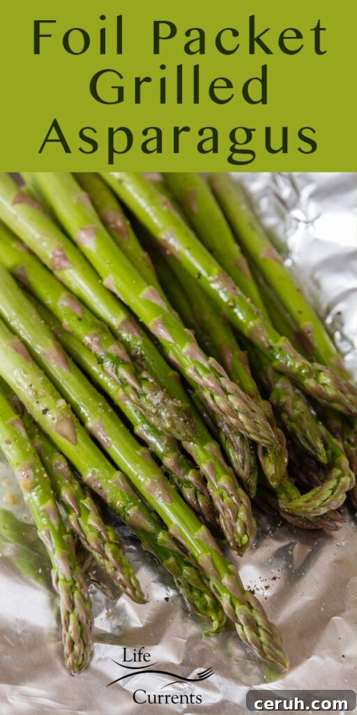 title on top: Foil Packet Grilled Asparagus above a picture of gilled asparagus