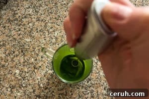 Mixing and frothing matcha powder in hot water