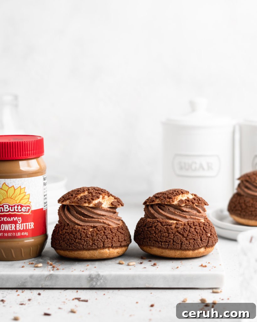 Cream puffs topped with a chocolate craquelin, filled with a creamy SunButter Milk Chocolate whipped ganache filling