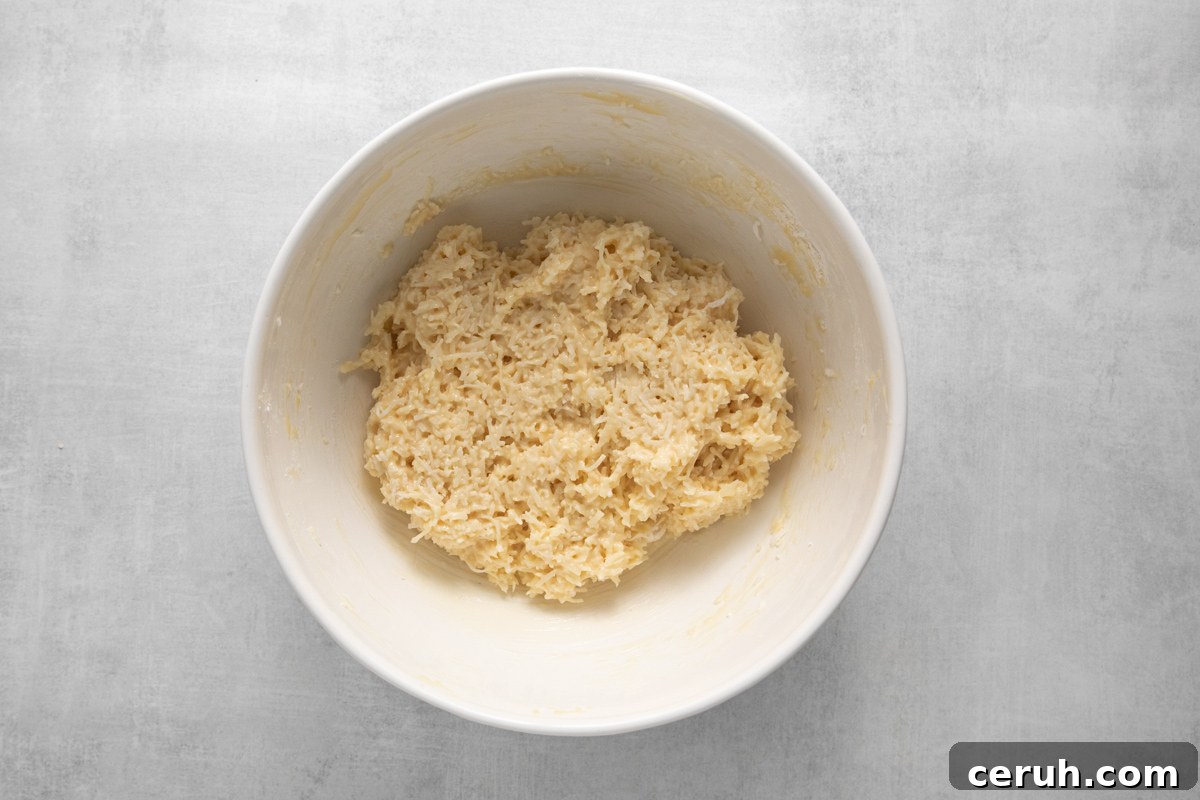 coconut truffle mix in a white bowl.