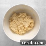 coconut truffle mix in a white bowl.