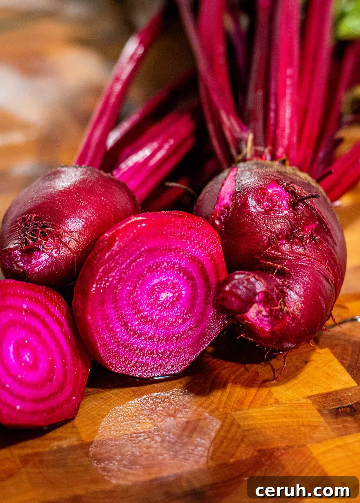 Fresh homegrown beets on a chopping block. 