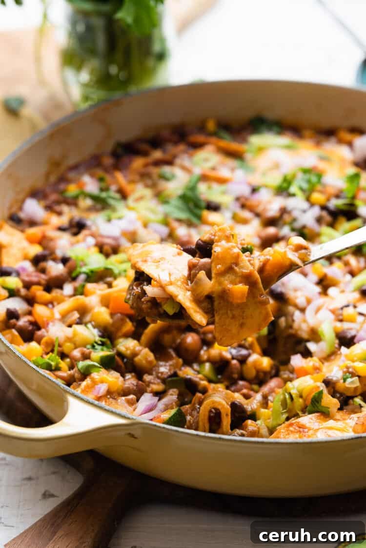 A spoonful of Vegetarian Enchilada Skillet Casserole. 