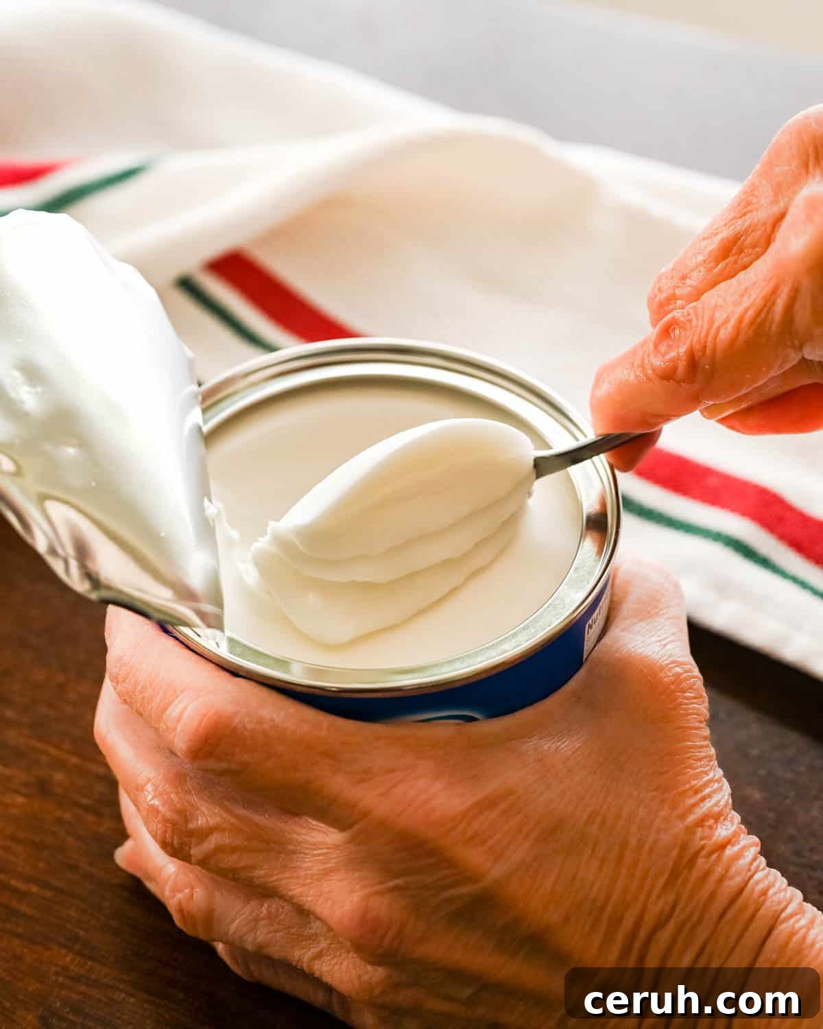 I am scooping an "egg-sized" portion of Crisco from the can.