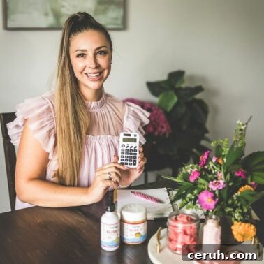 A picture of Emily Kyle with a calculator.