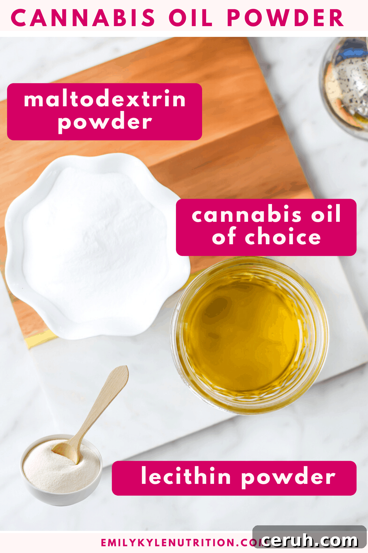A white countertop with a cutting board and on top is a bowl full of maltodextrin powder, a cup of oil, and a picture of lecithin