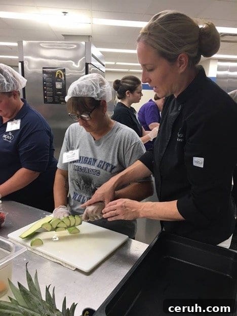 Workers using knife to cut vegetables