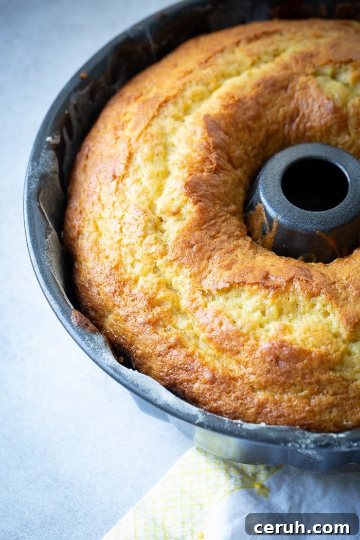 A yellow banana bundt cake in a bundt pan