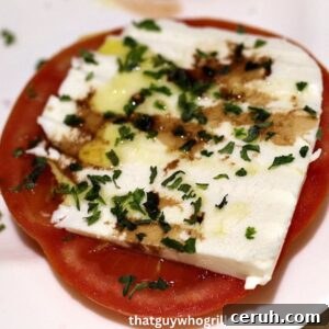 Tomata Caprese Appetizer On White Plate