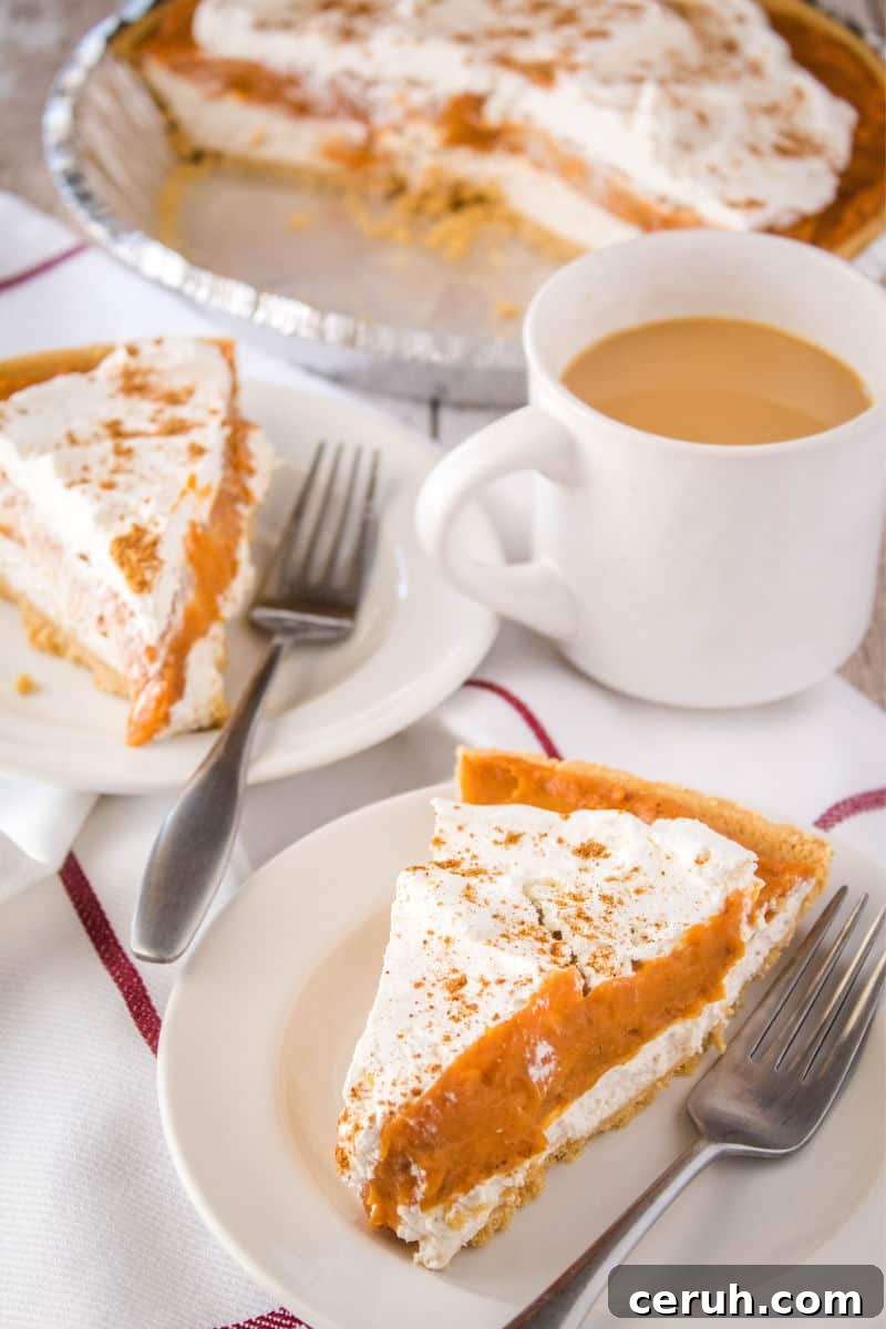 slices of double layer pumpkin pie on dessert plates
