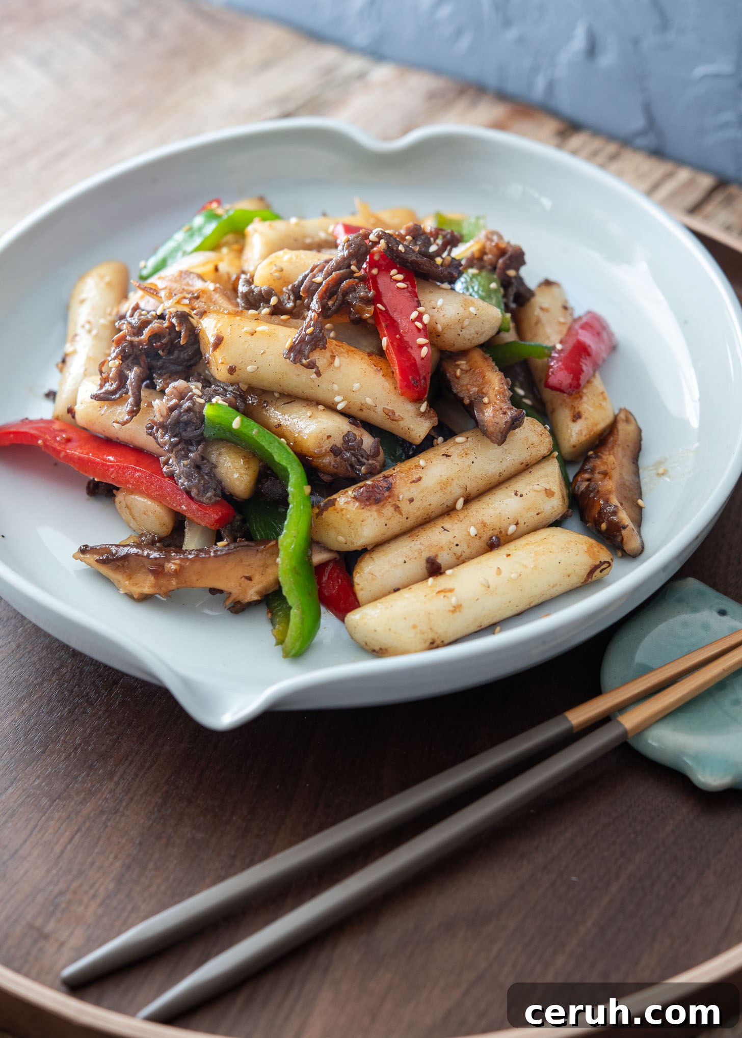 Non-spicy royal court tteokbokki with beef and vegetables.
