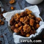 A bowl of spiced nuts with Szechuan pepper.