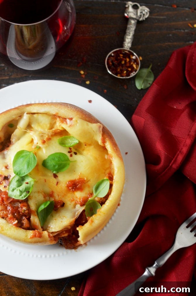 How to Make Cheesy Pizza Bowls at Home 5 Pizza Bowls. Tomato sauce, sausage, and two types of cheese are nestled into bowls, covered with pizza dough, and flipped to reveal individual pizza dinners that will rock your tastebuds. | hostthetoast.com