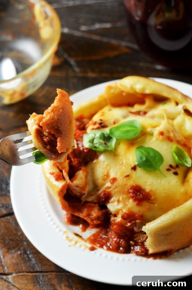 How to Make Cheesy Pizza Bowls at Home 6 Pizza Bowls. Tomato sauce, sausage, and two types of cheese are nestled into bowls, covered with pizza dough, and flipped to reveal individual pizza dinners that will rock your tastebuds. | hostthetoast.com