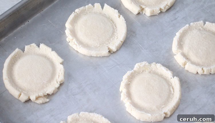 Lemon Sugar Cookies Recipe with Video Tutorial 8 sugar cookies pressed flat before baking