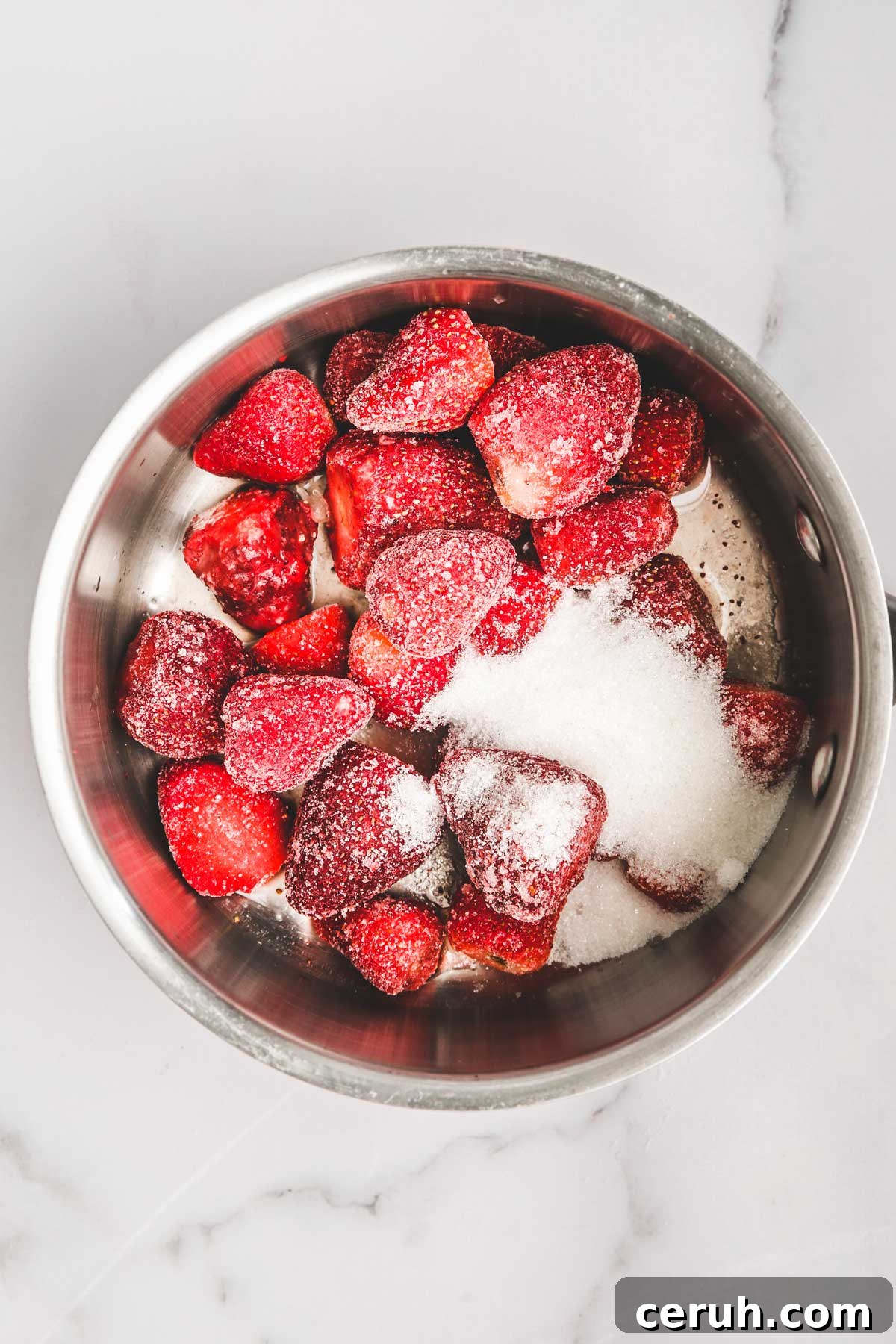 Homemade Strawberry Compote Recipe for Fresh Berries 4 strawberries cooking with sugar in a saucepan