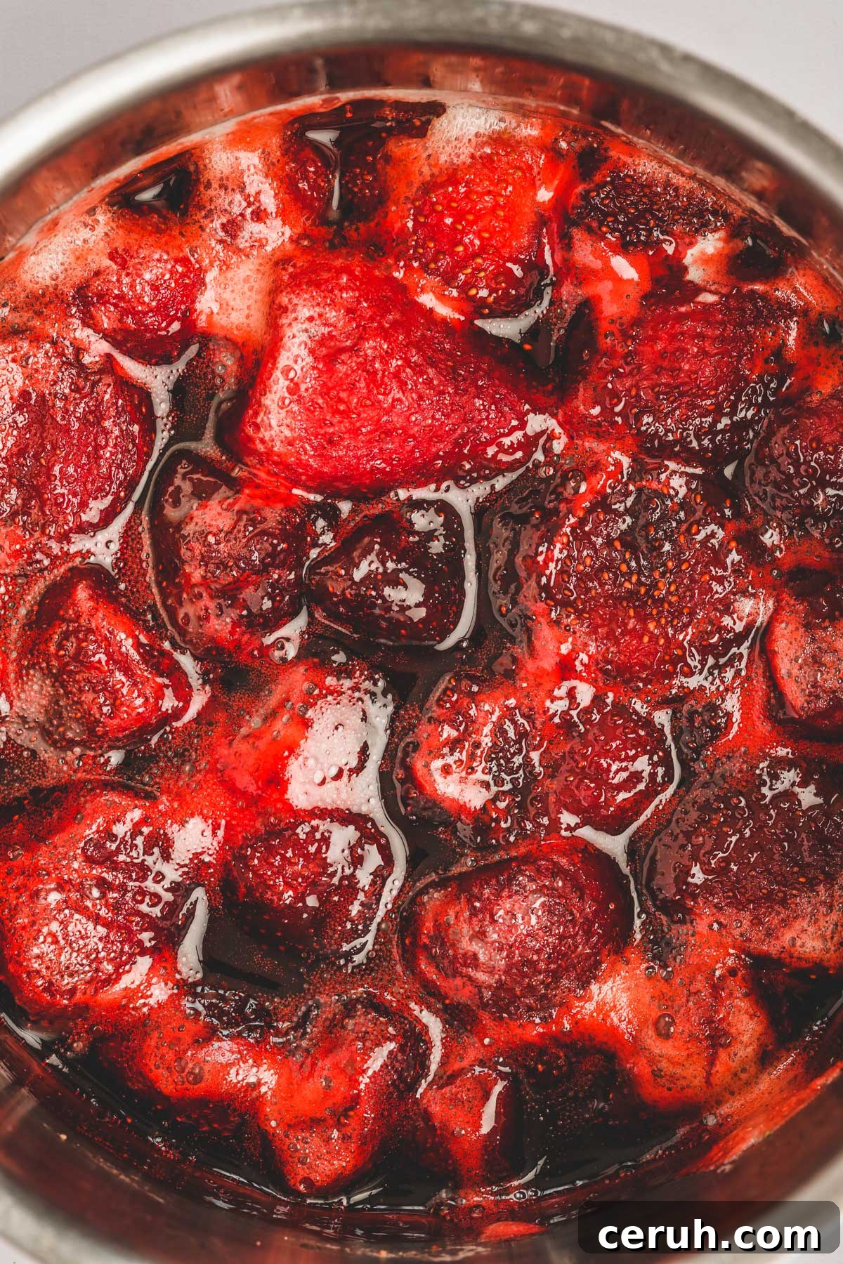 Homemade Strawberry Compote Recipe for Fresh Berries 5 homemade strawberry compote cooking on the stove