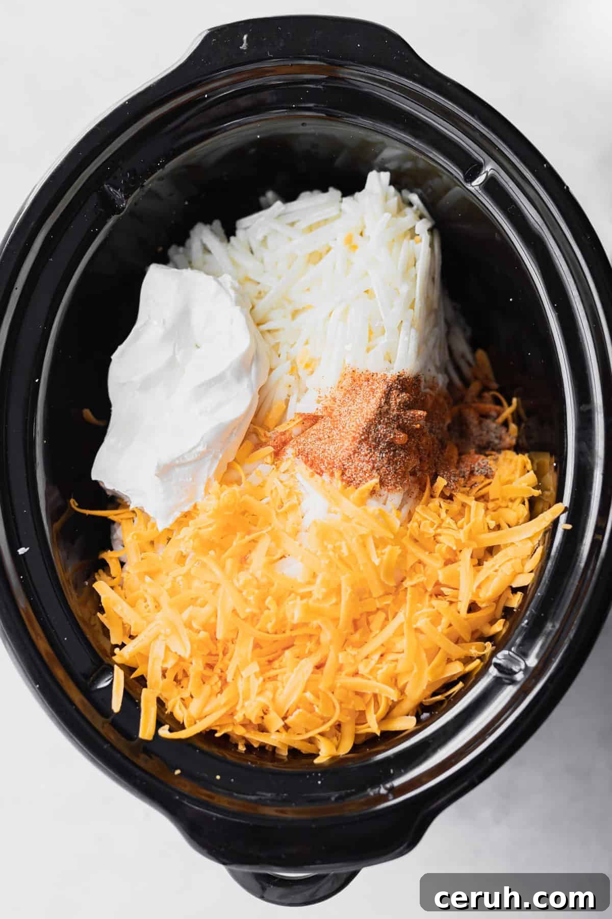 ingredients for crockpot cheesy potatoes in slow cooker