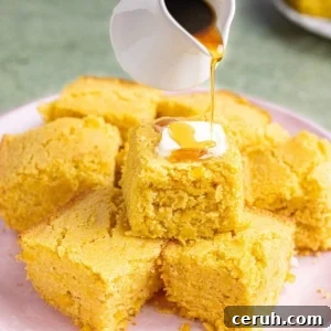 cornbread without eggs stacked on a plate.
