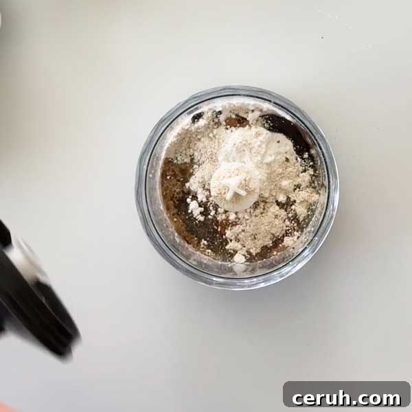 Gluten-Free Graham Cracker Crumbs for Baking and Desserts 3 Adding the ingredients to the chopper cup with an immersion blender.