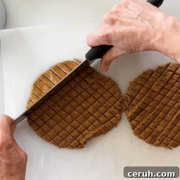 Gluten-Free Graham Cracker Crumbs for Baking and Desserts 7 Slicing the rolled out cookie dough and slicing with a knife into small bits.