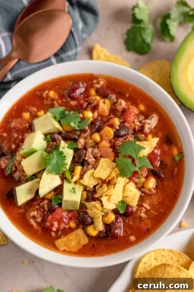 Slow cooker taco soup with avocado.