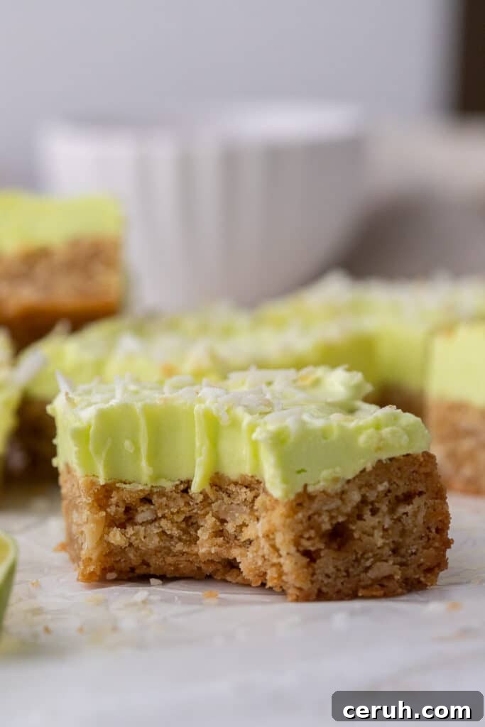 Straight on shot of lime frosted coconut bars