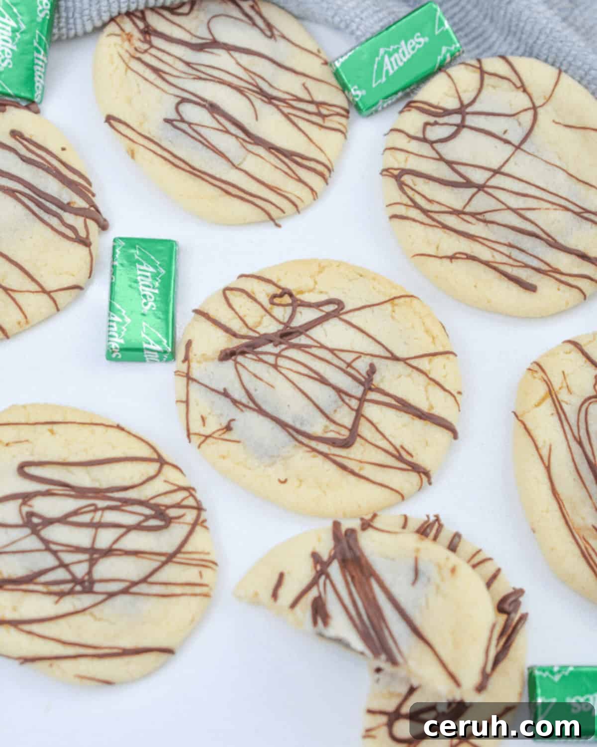 A tray of the finished chocolate mint cookies with andes candies.