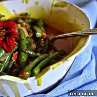 Simple Stewed Green Beans soak up the flavors of the onions, tomatoes, garlic and herbs as they cook. Best of all, you only dirtied one pot.