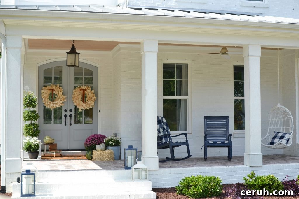large front porch with fall window boxes