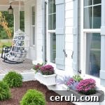 fall window boxes with purple mums and kale