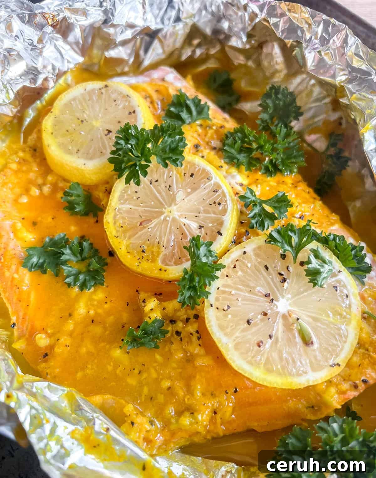 Baked lemon ginger turmeric salmon in foil.