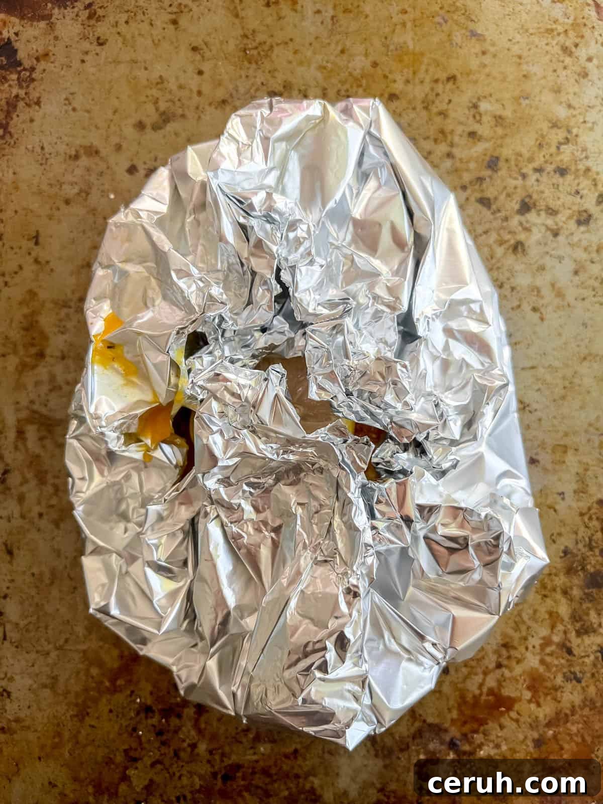 Salmon wrapped in foil.