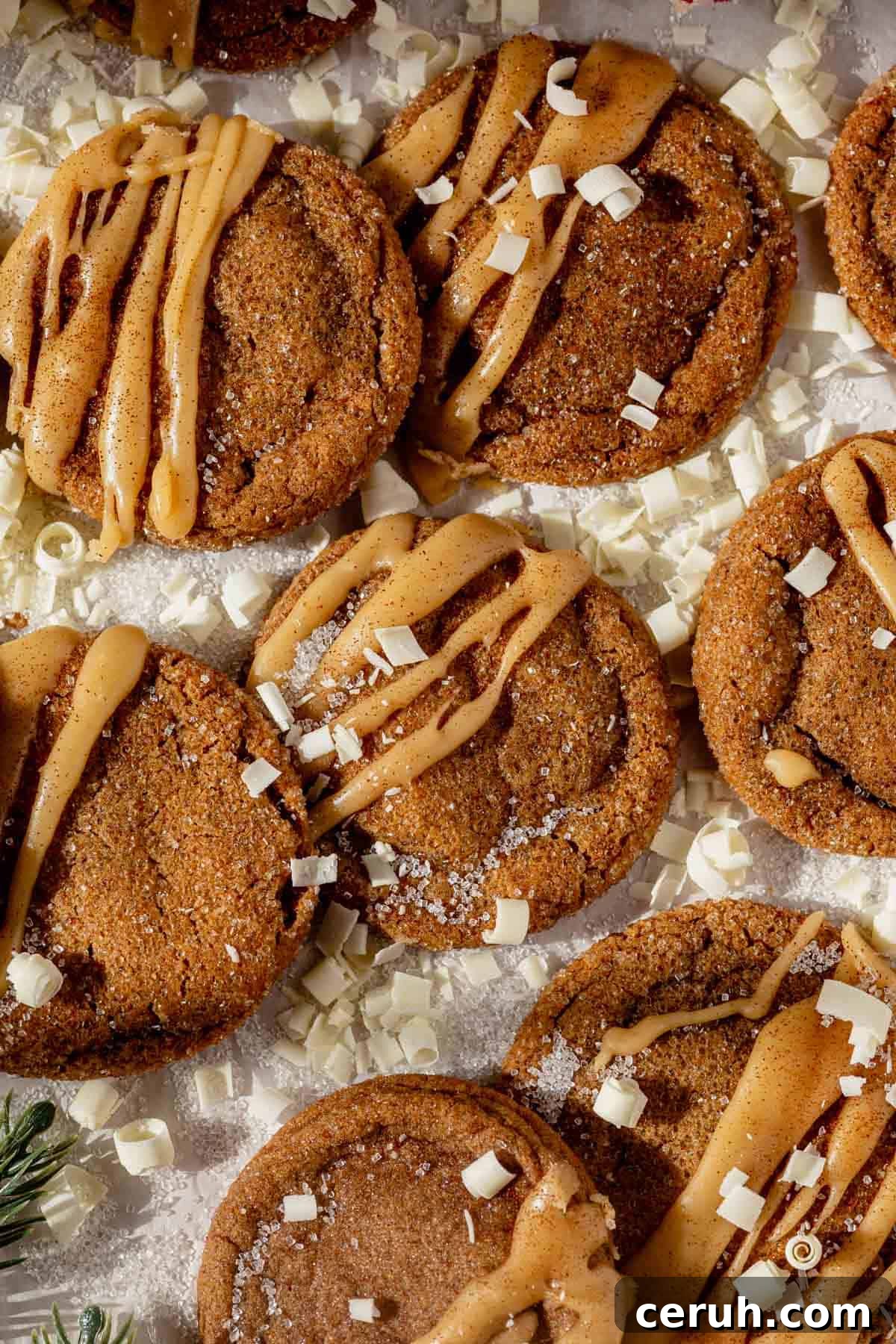 iced gingerbread latte cookies surrounded by white chocolate curls.