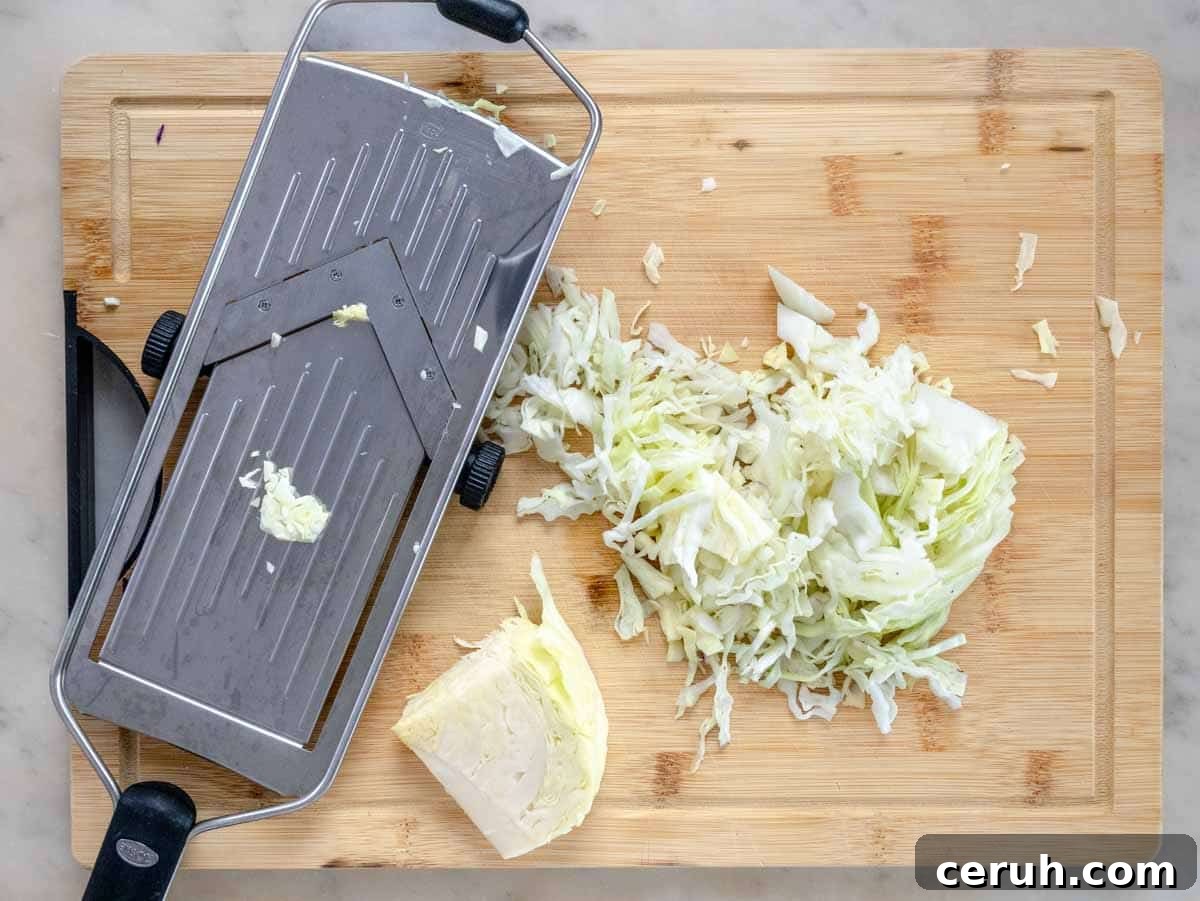 Classic Creamy Coleslaw Recipe for BBQs and Weeknight Meals 6 cabbage sliced with a mandoline slicer