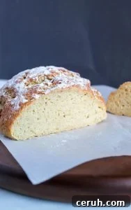 gluten free artisan bread interior on a wooden board.