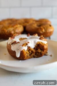 bite of a gluten free carrot cake donut