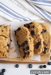 gluten free blueberry bread sliced on a counter