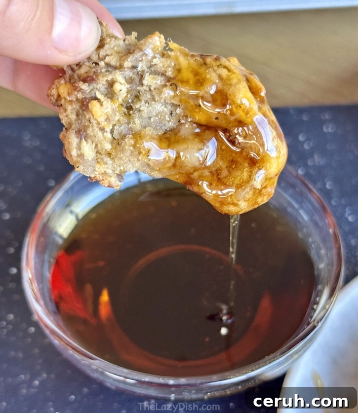 Pancake sausage balls dipped in syrup make the best breakfast ever. This sausage bite recipe is so simple with just 4 ingredients you may already have at home. Make a double batch and freeze some for those busy mornings when you need a quick breakfast idea. 