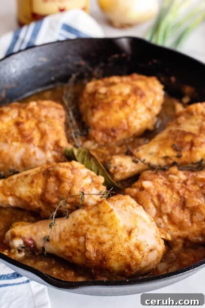 Add chicken back to skillet along with thyme and bay leaf.