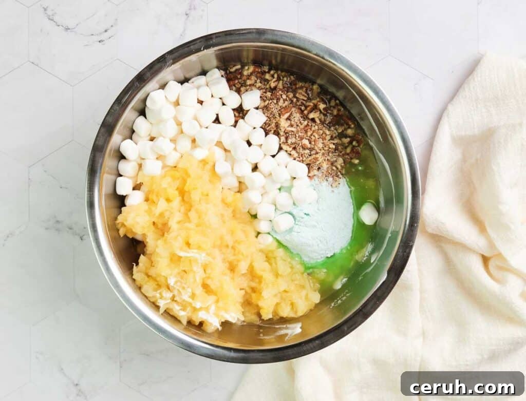 pistachio fluff ingredients in a metal bowl