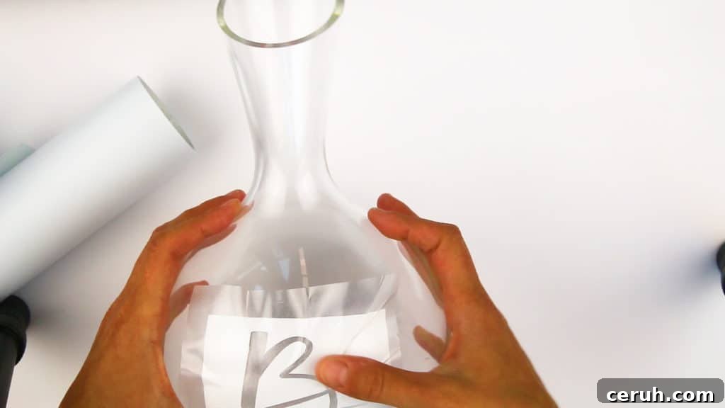 How to Etch a Wine Decanter with Your Cricut: Step-by-Step Guide 12 Apply vinyl to decanter