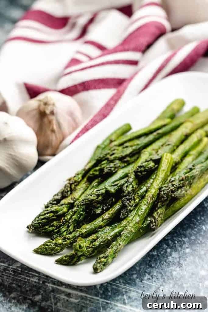 15 Classic Sides to Serve with Beef Stroganoff 11 Air fryer asparagus on a platter.