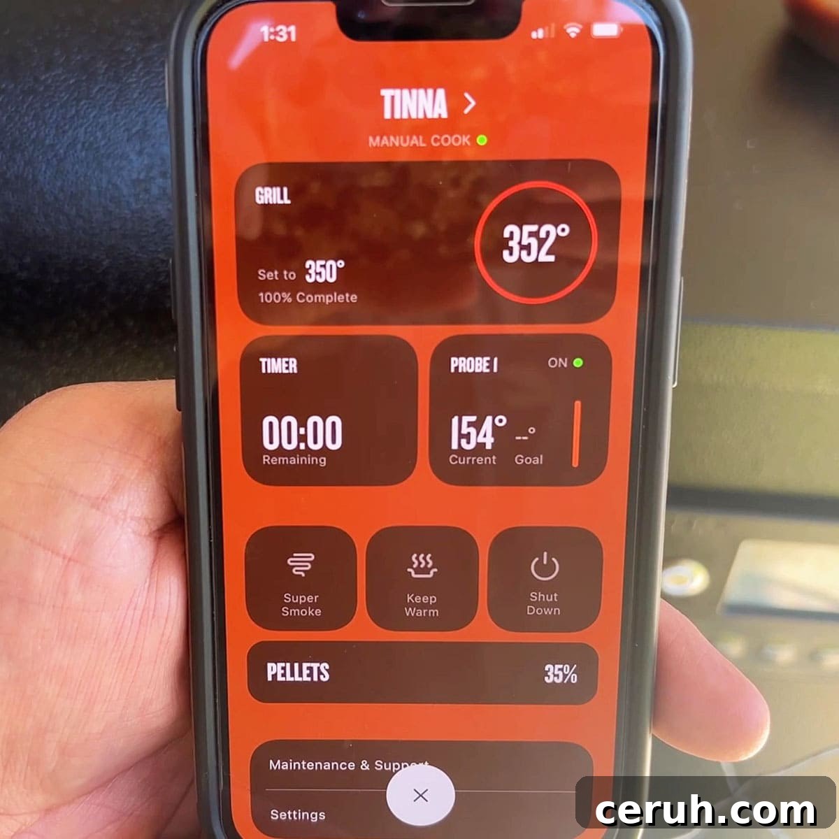 Traeger phone app showing the internal temperature of 155 degrees.