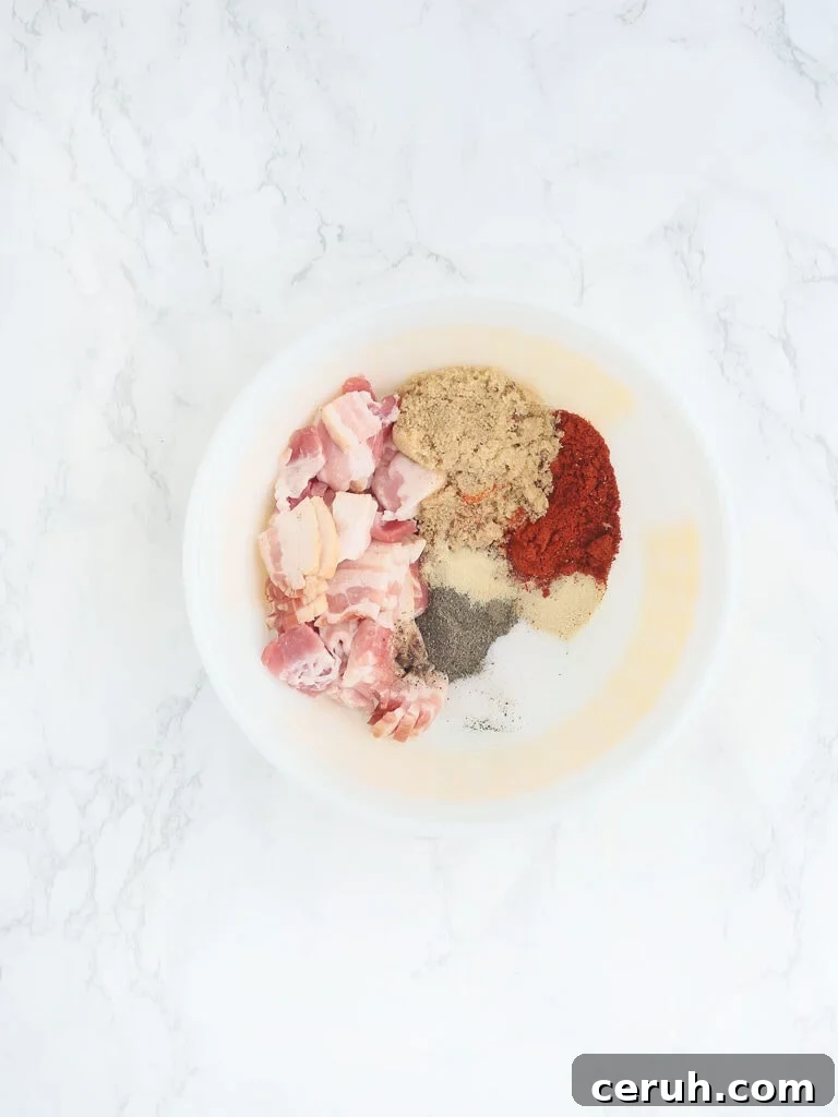 Bacon paste ingredients unmixed in a white bowl.