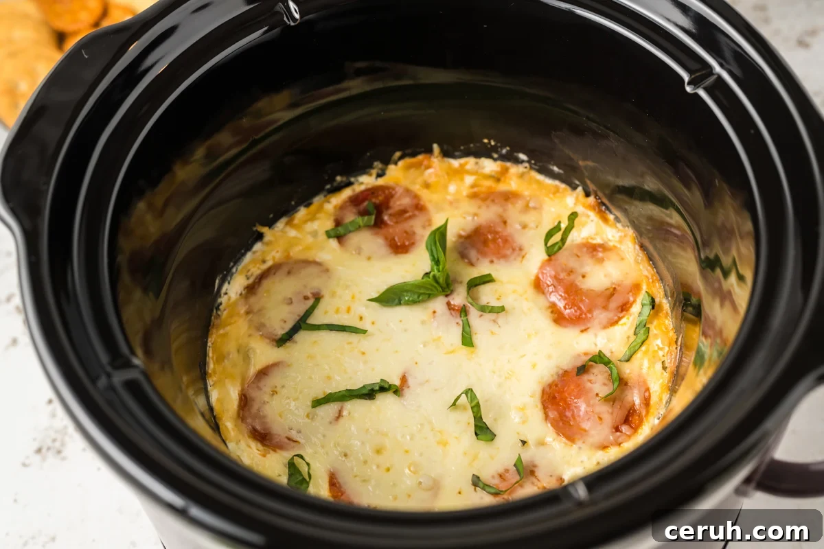 white pizza dip in a crockpot.