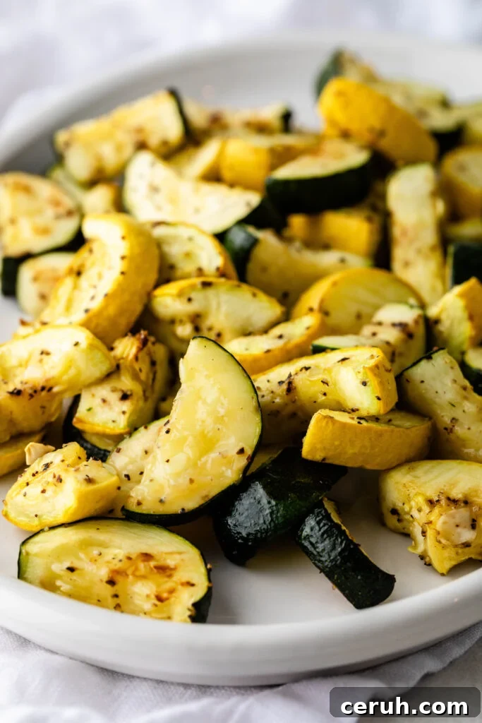 Roasted Zucchini and Summer Squash with Garlic and Parmesan 2 easy roasted zucchini and squash on a plate
